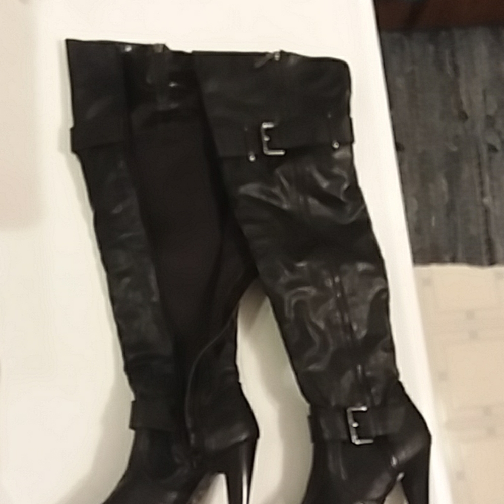 Black high heel Guess boots size 5.5